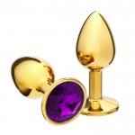 Малая металлическая золотистая анальная пробка Оки-Чпоки с фиолетовым кристаллом - 7 см